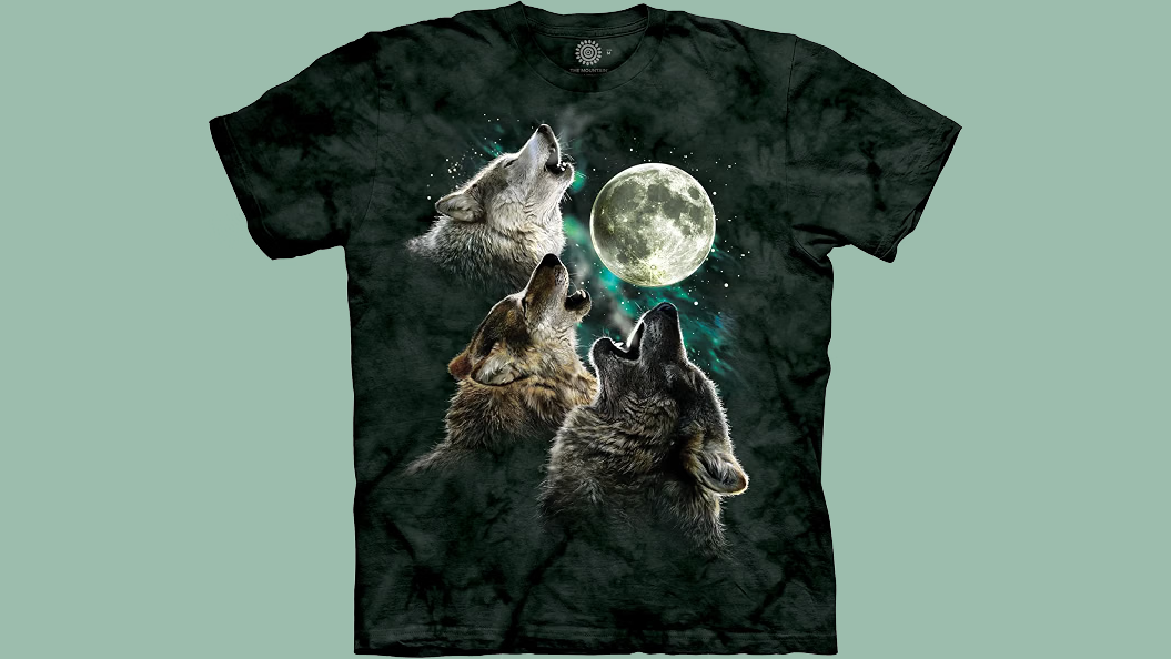 Three wolves howling at a full moon on a dark tie-dye T-shirt